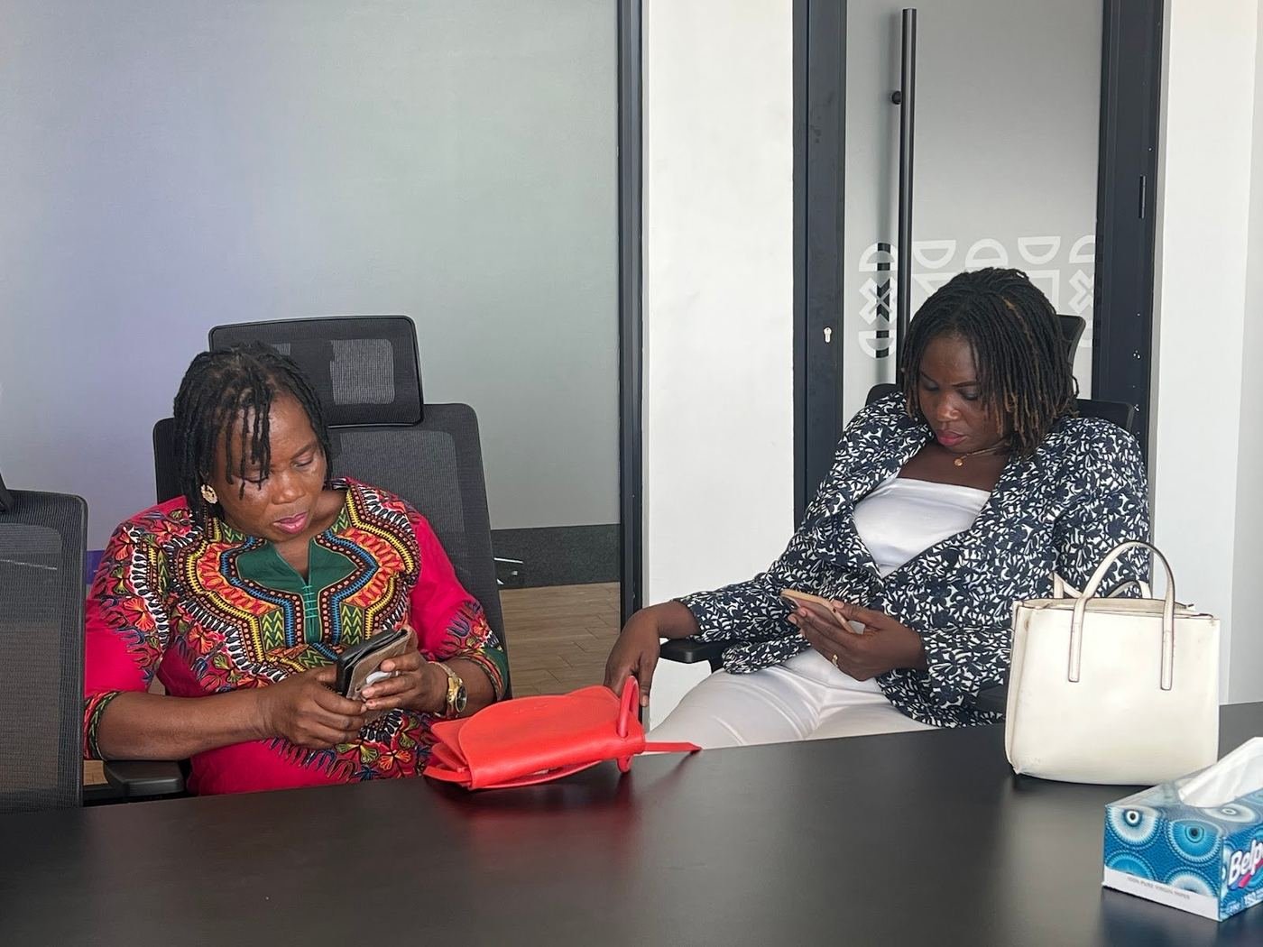 Two CTSG team members in discussion at the quarterly meeting