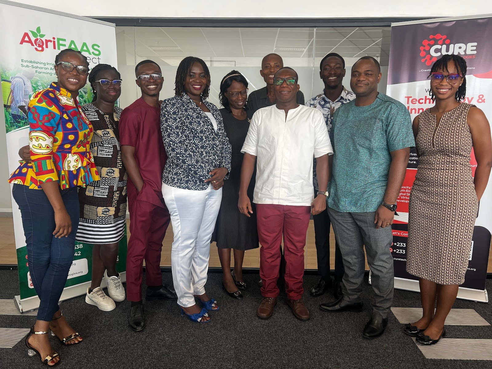 CTSG team in front of AgriFAAS and Cure Technologies banners